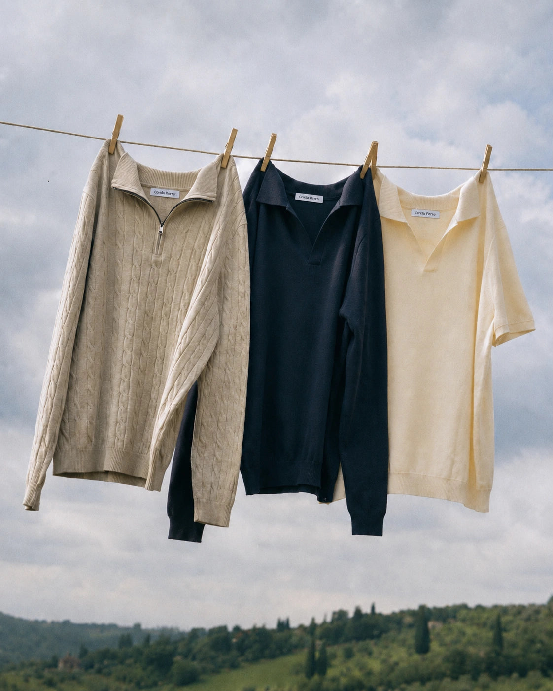 Cerella Pierre knitwear hanging on a countryside clothesline